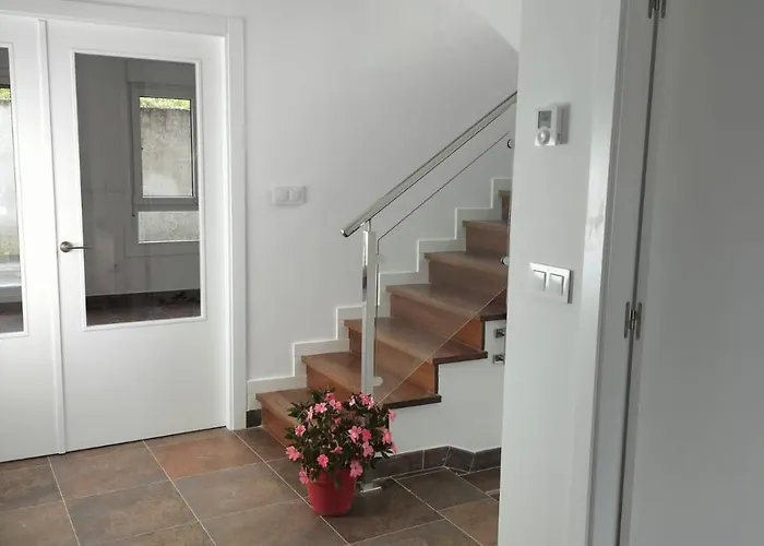 - A Lanzada Ferienhaus *